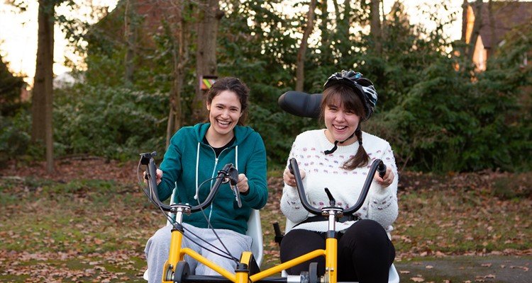 Joanne cycling with Anna