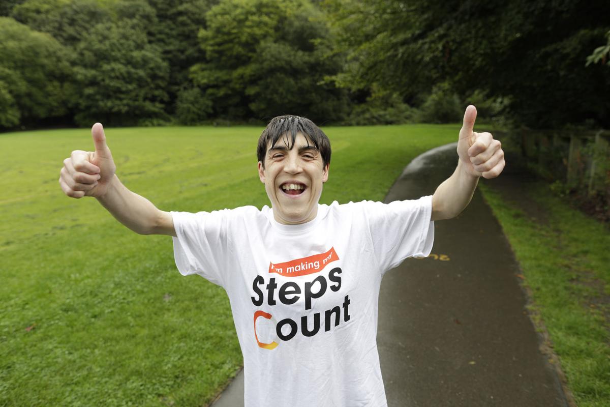 Rebecca shows off her Steps Count tshirt while doing laps of the park