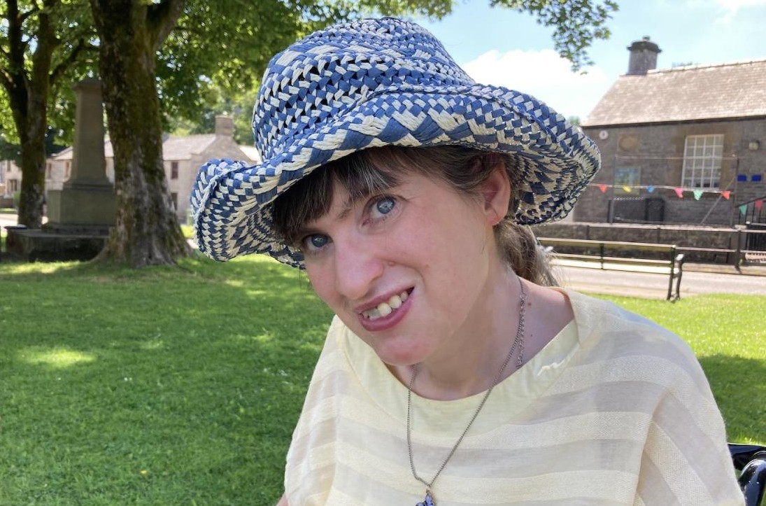 Catherine smiling outdoors