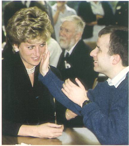 Chris touching Diana's cheek