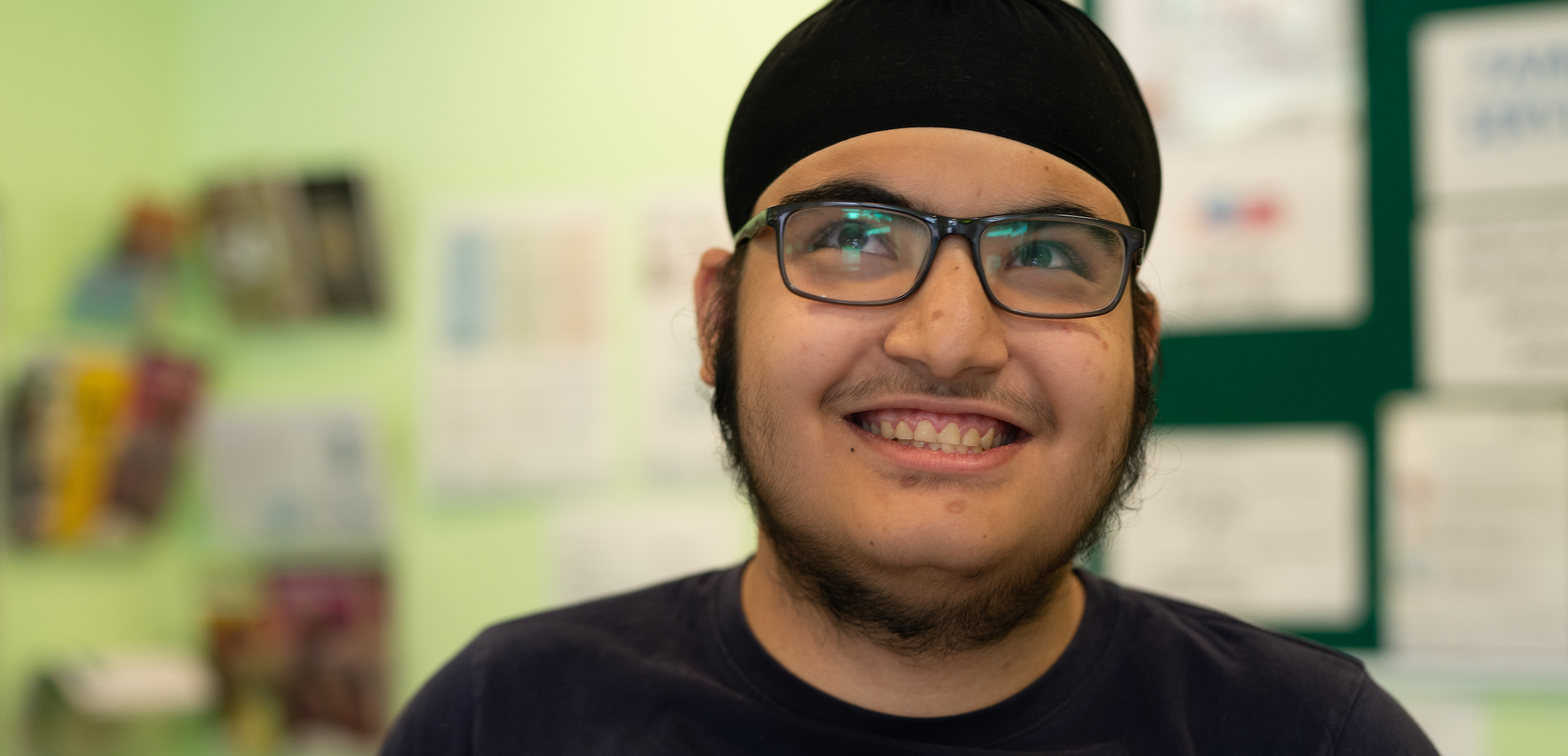 A boy wearing glasses