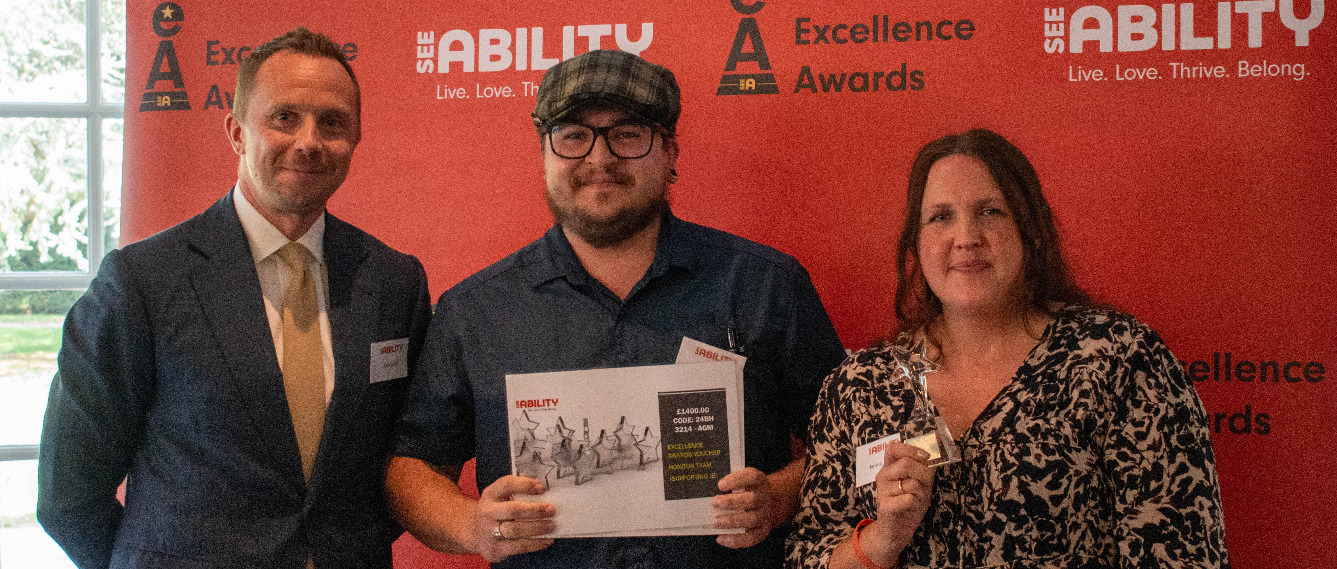 John's team accept their award