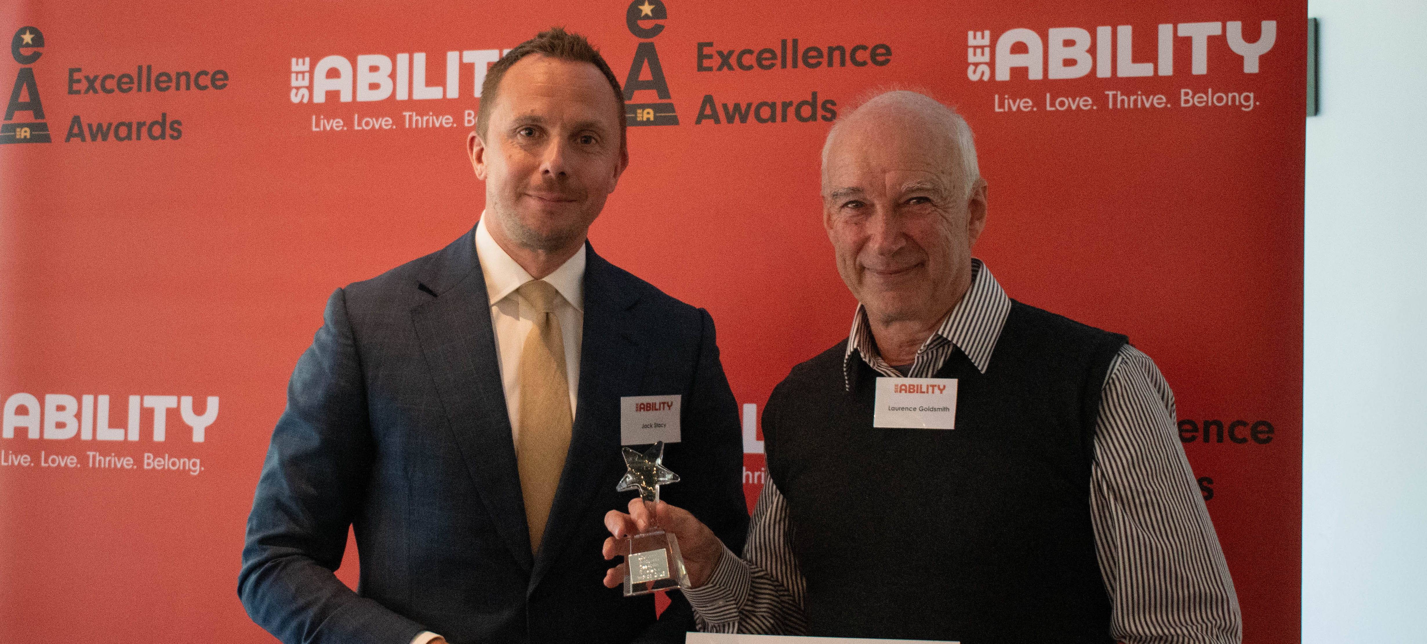 Laurence accepts his award