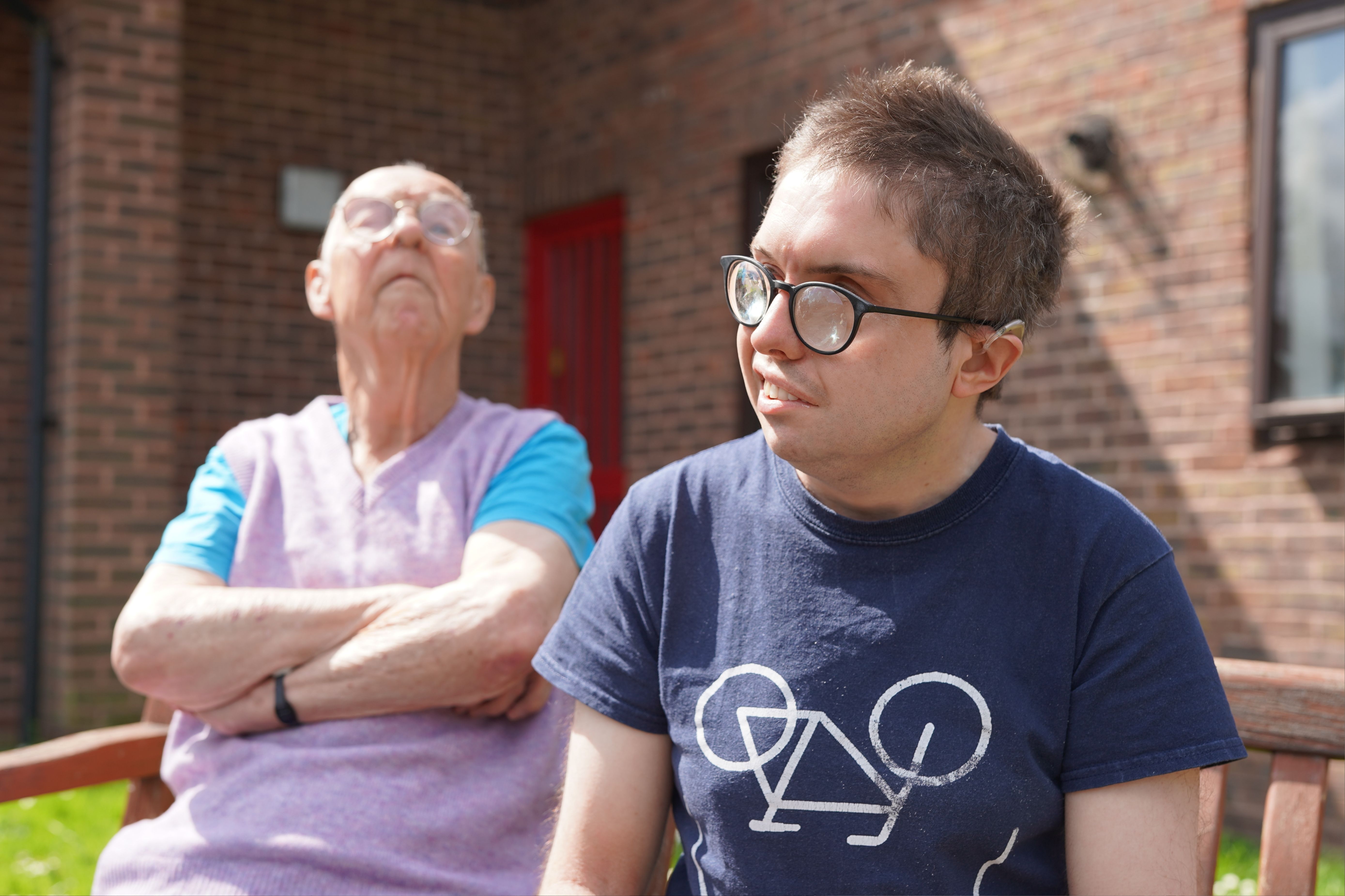 David and Ivan sitting outside at Spencer Court