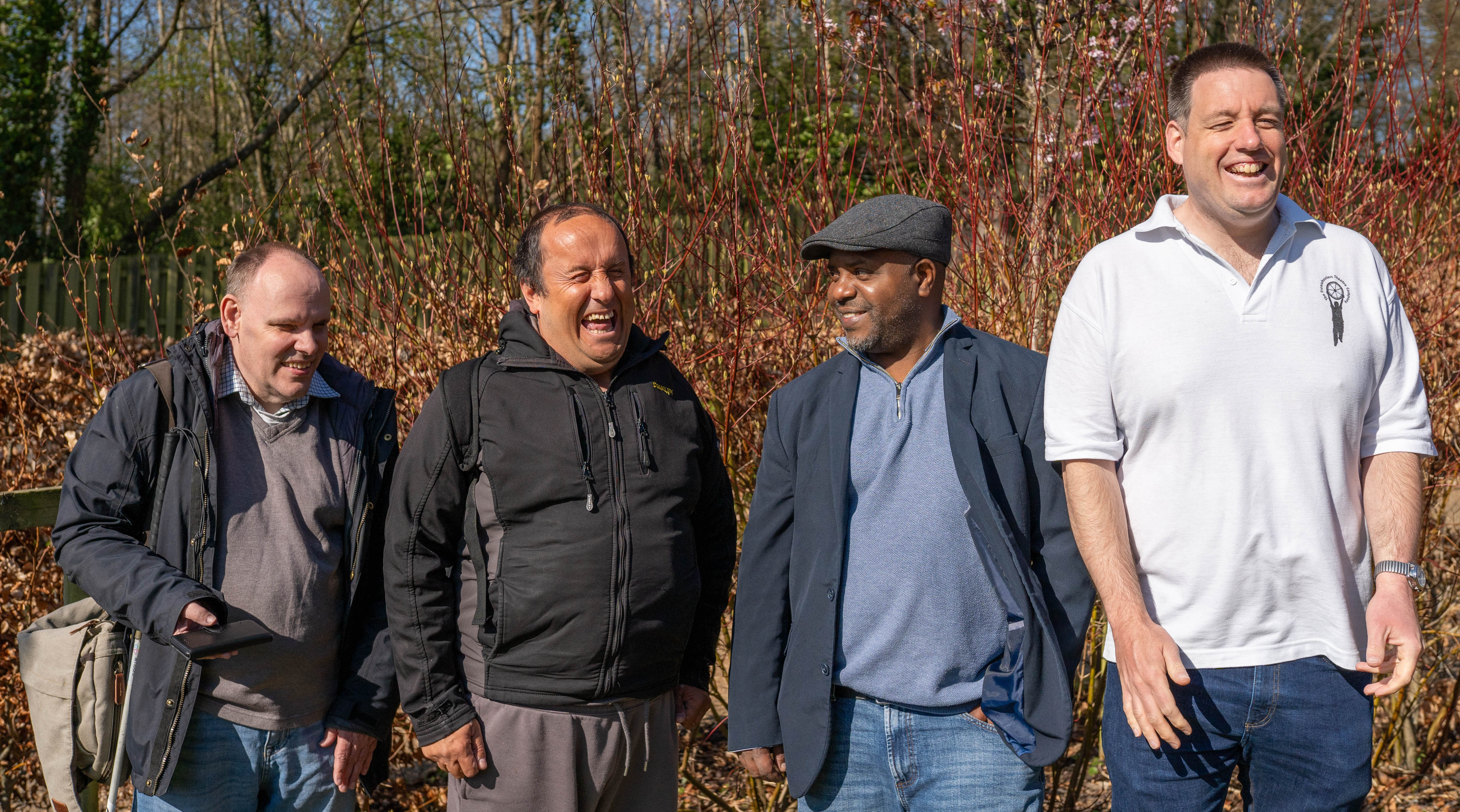 A group of support workers and people supported at Redhill
