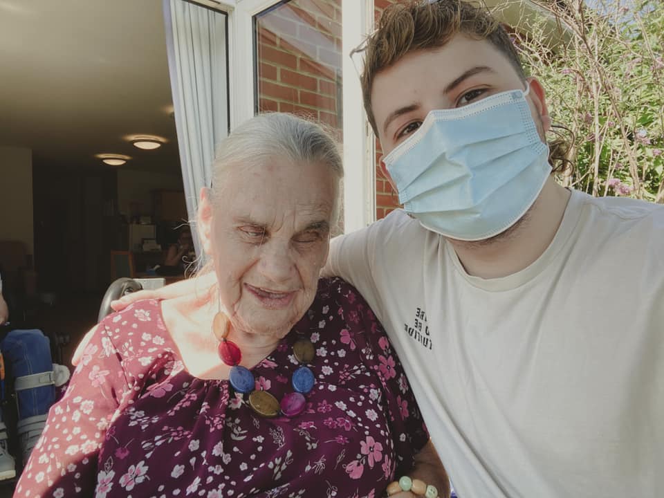 Joyce and Jamie sitting in the garden. 
