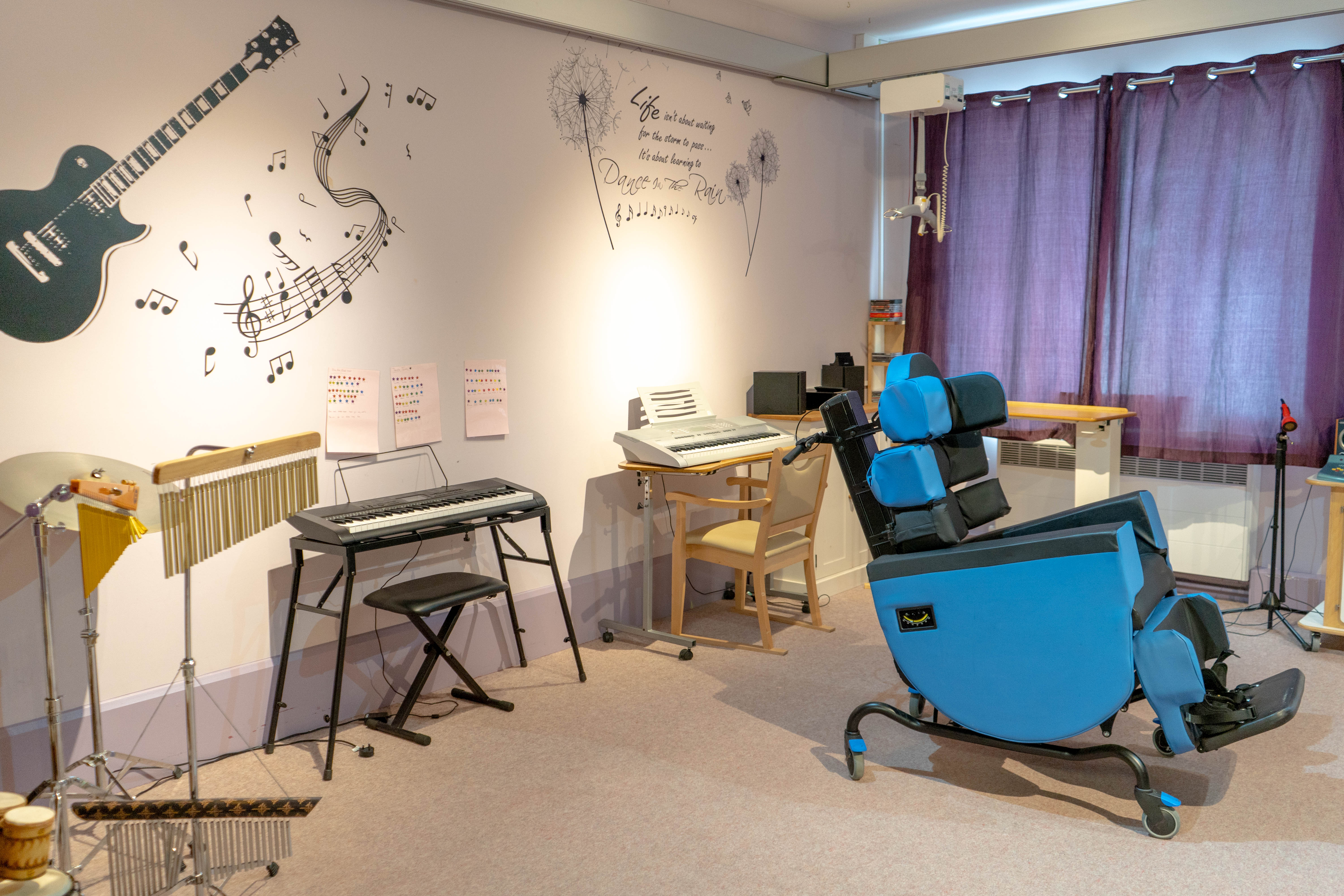 The music room at Heather House, with keyboards and other instruments