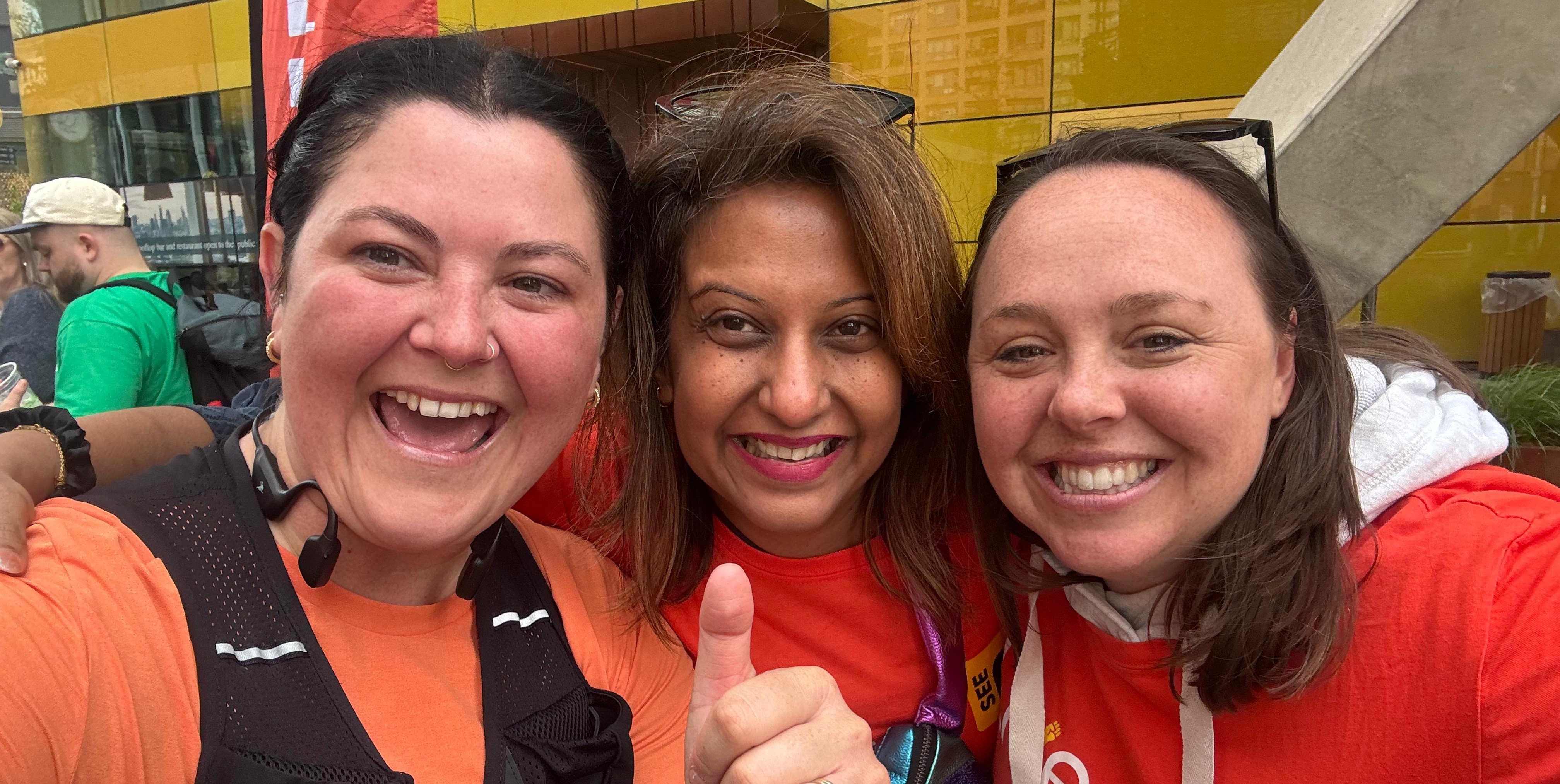 Rhian, Farah and Emily celebrate during the marathon
