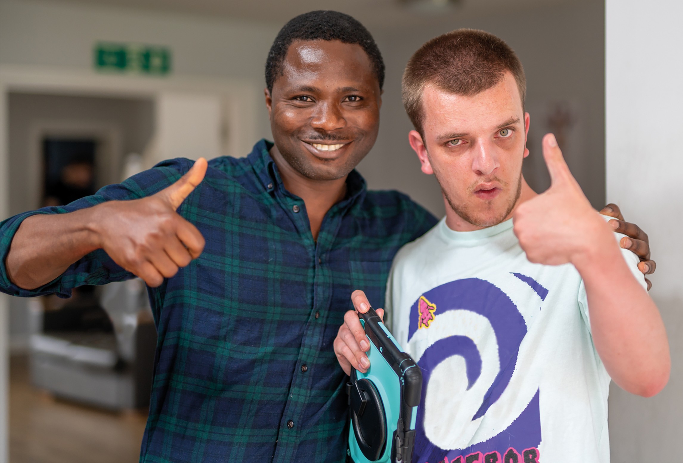 Jake and his supporter doing a thumbs up