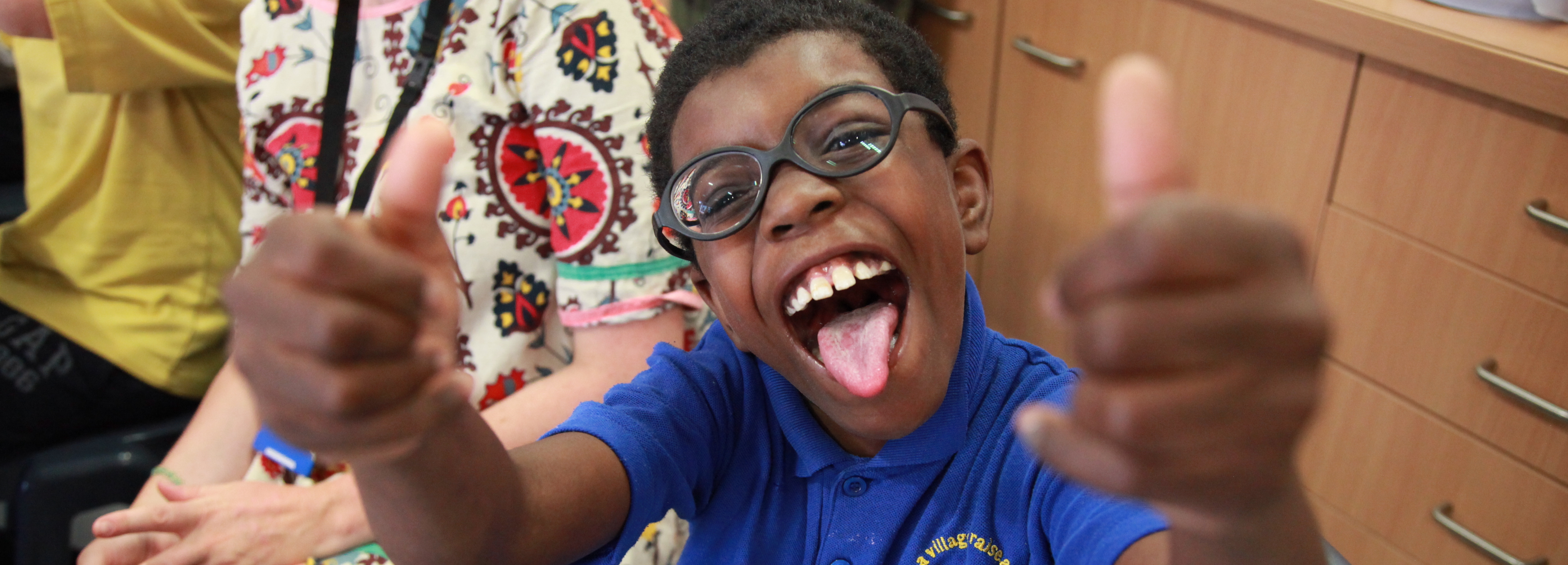 Keiron smiling with glasses