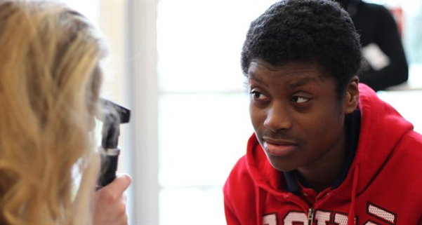 Leon receiving an eye test