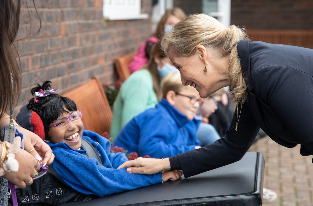 The Countess of Wessex meets a child at Perseid School