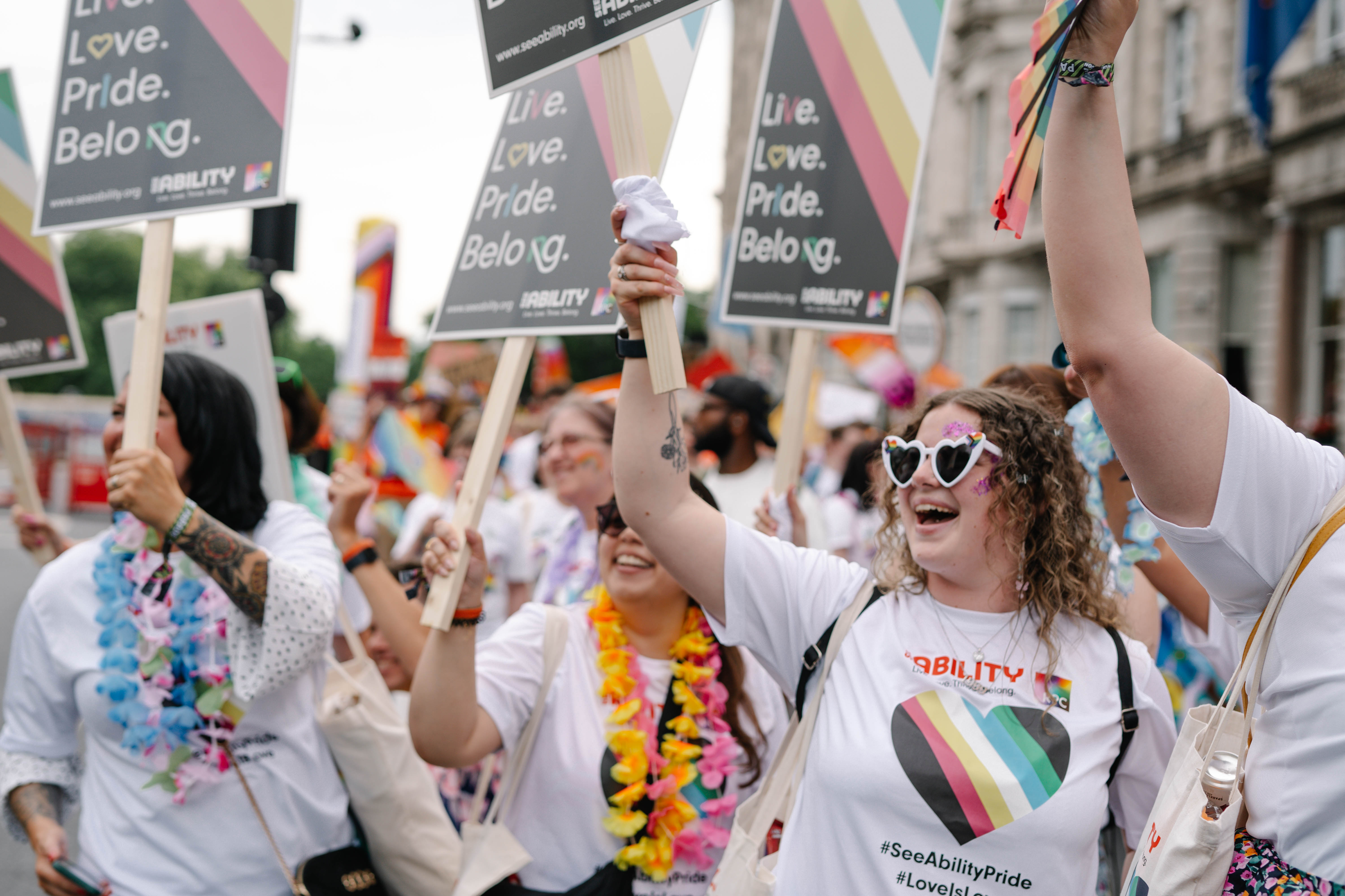 SeeAbility Pride march with placards