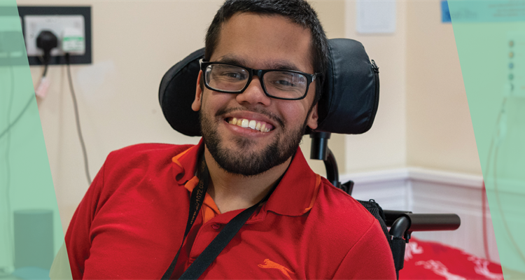 Daniel smiling at the camera