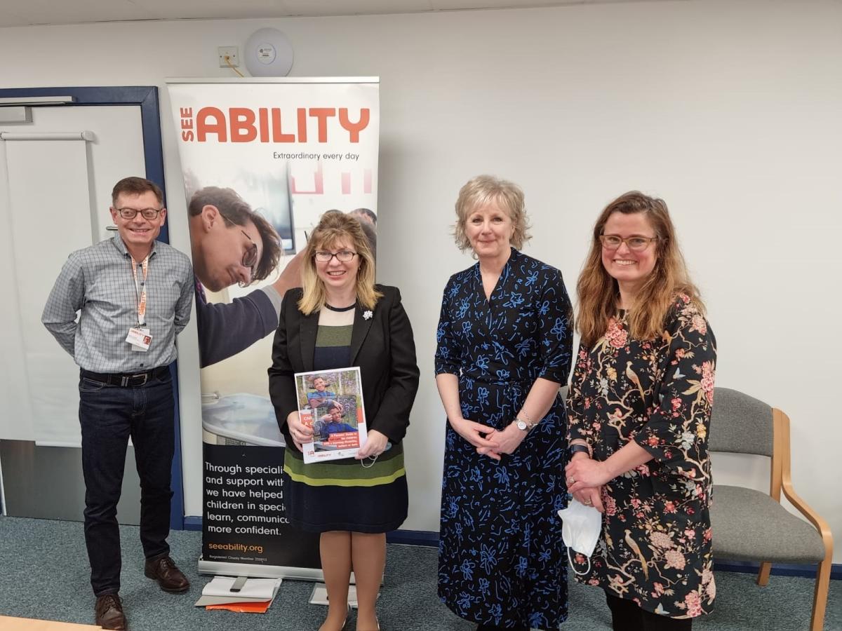 Minister Maria Caulfield with school and eye care staff