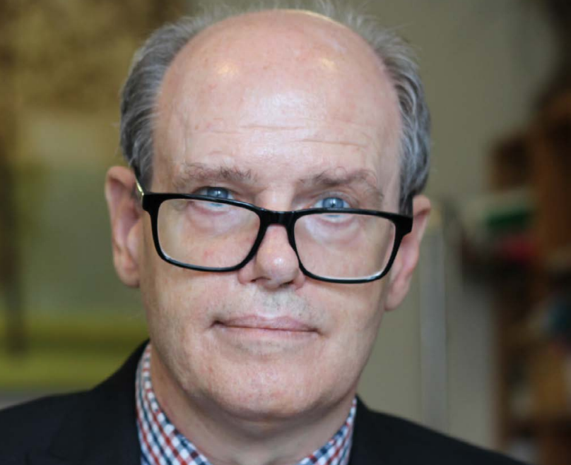 David wearing glasses