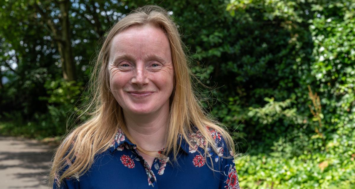 Joanne standing outdoors