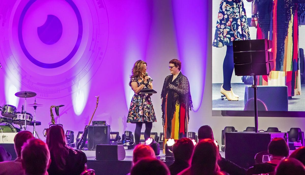 Grace and Lisa speaking at the Optix conference