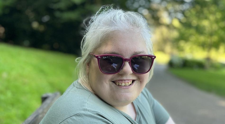 Lucy sitting in a park