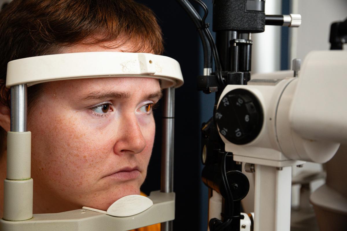 A photo of Grace, Eye Care Champion, having an eye test.