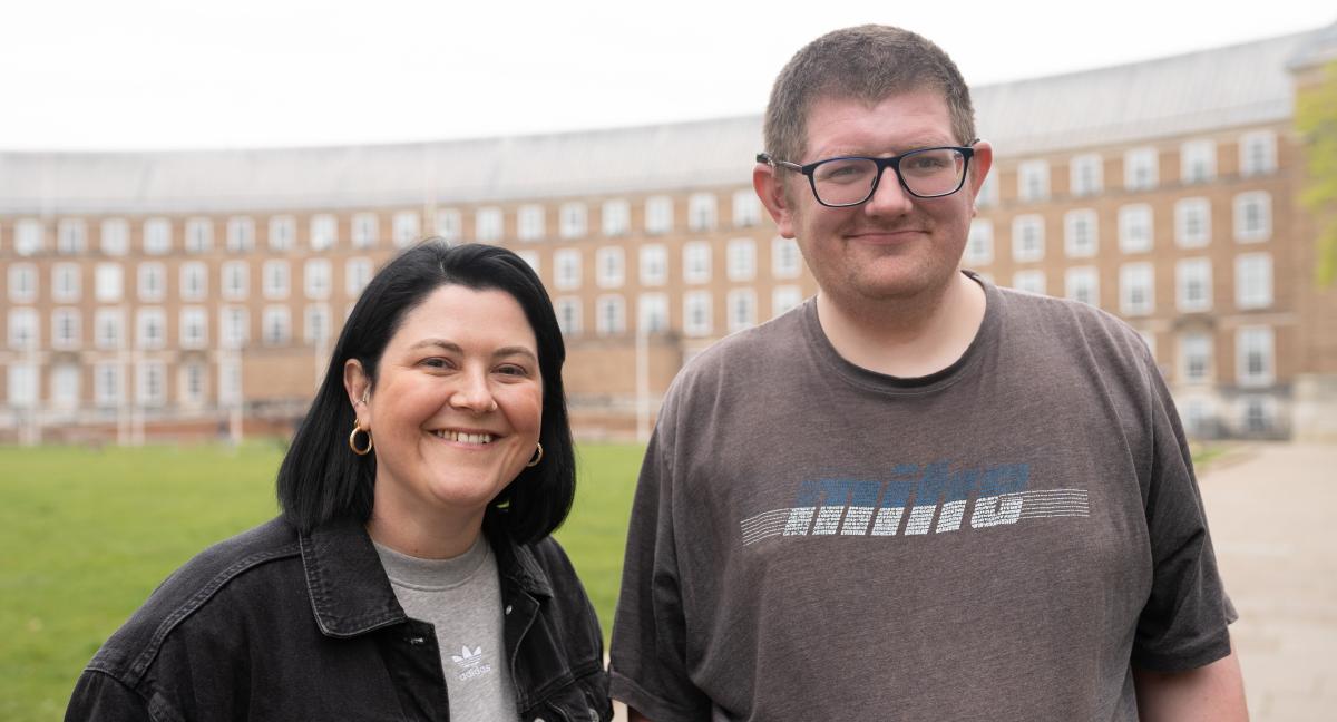 Rhian standing next to Mikey, who she supported to find a job