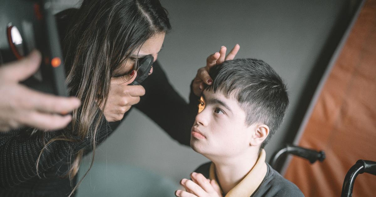Malvi provides a sight test to Yusuf at a special school.