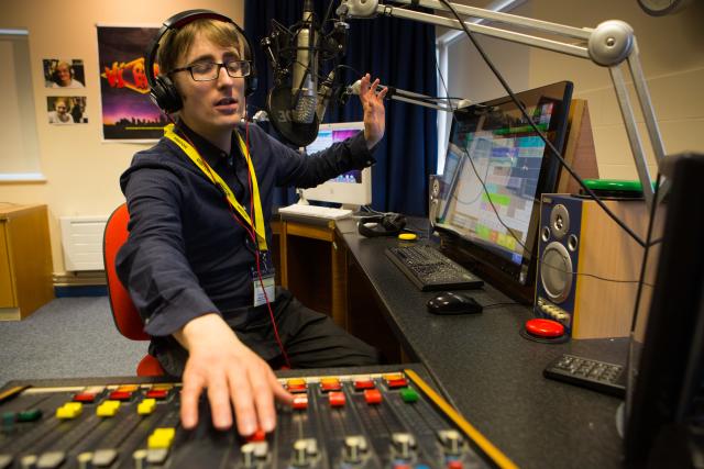 Ian working at a radio station