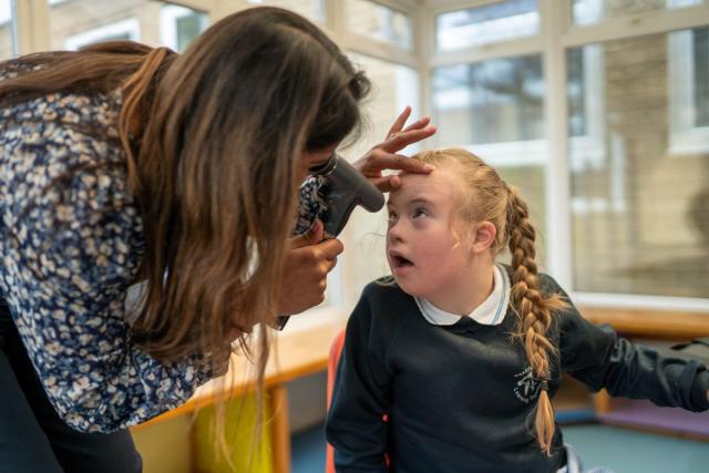 Ellie having an eye test at school