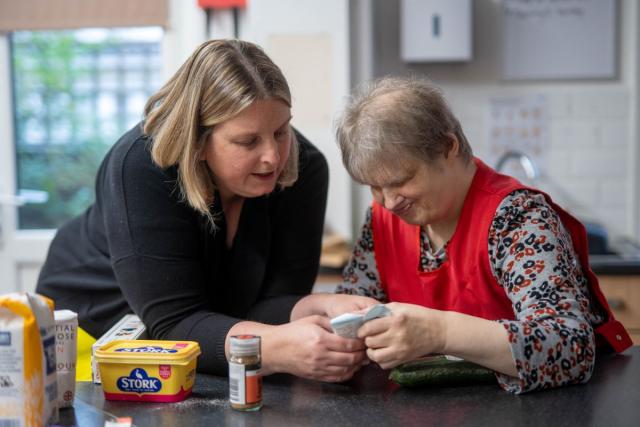 Aylee and Sammy baking in a kitchen