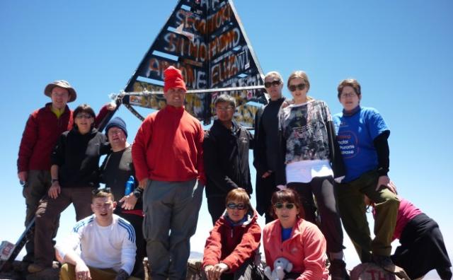 People on the summit of Toubkal celebrating 