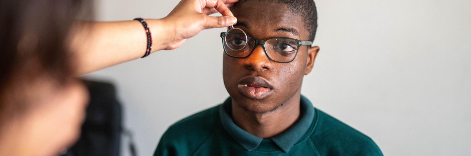 Adeboye having his sight tested