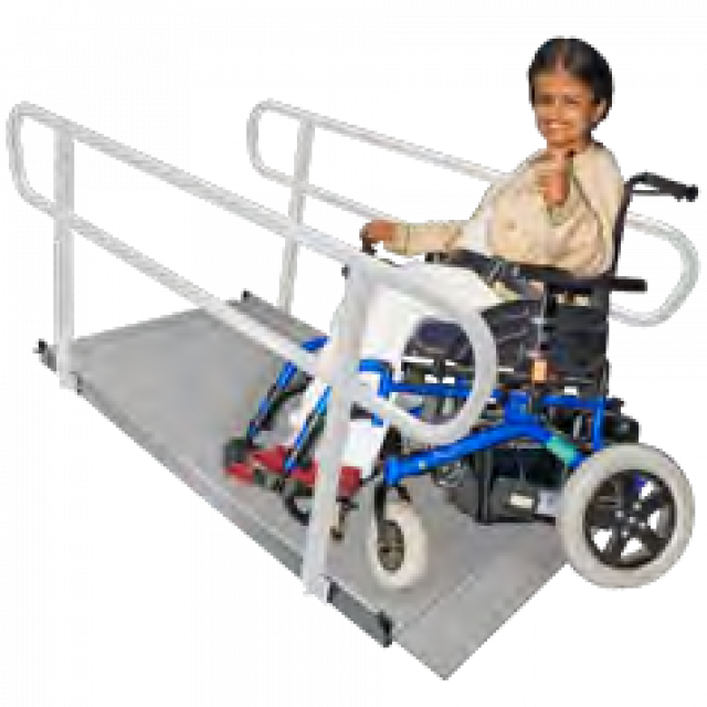 A lady in a wheelchair using an accessible ramp