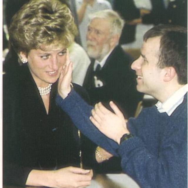 Chris touching Princess Diana's face