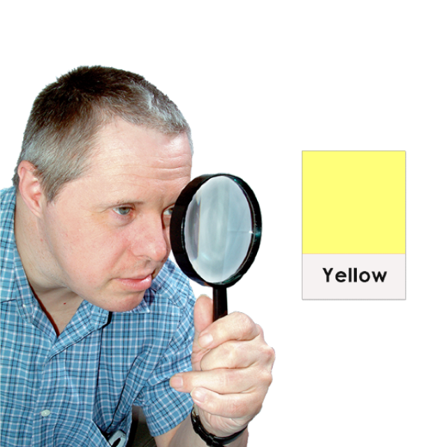 A person looking closely at the colour yellow