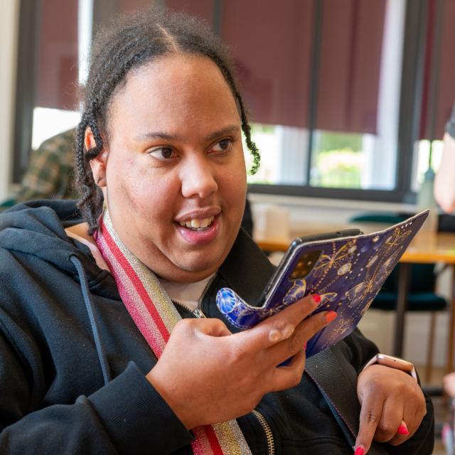 Tamika using her mobile phone