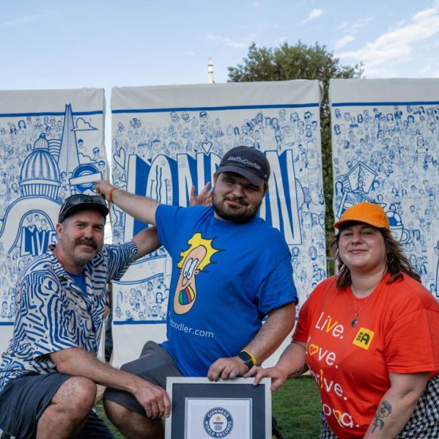 Luke, Alex and Georgie with the mural