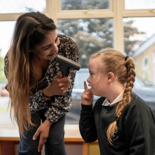 Malvi provides an eye check with Ellie