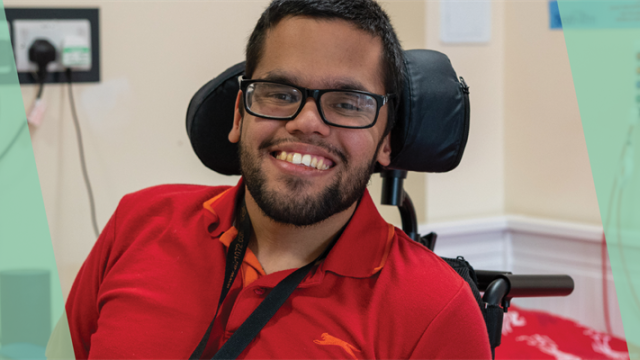 Daniel smiling at the camera