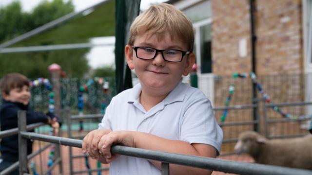 A boy with glasses.