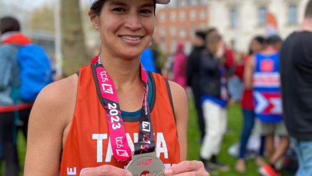 A Marathon runner with her medal