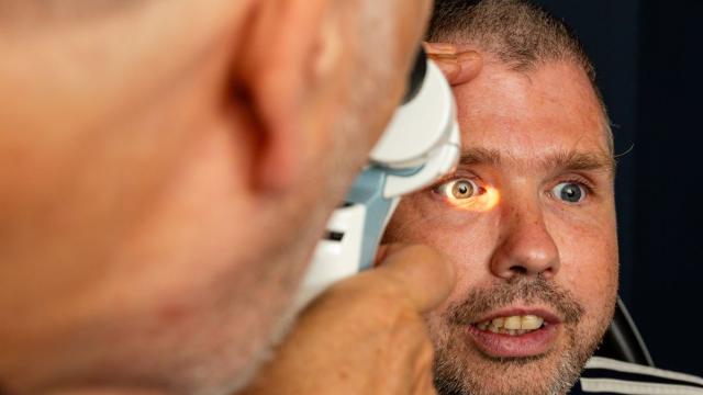Lee having an eye test