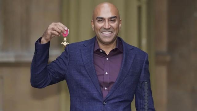 Amar with his OBE 