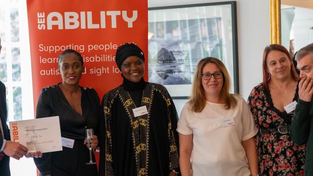 Horley Support team receiving an award