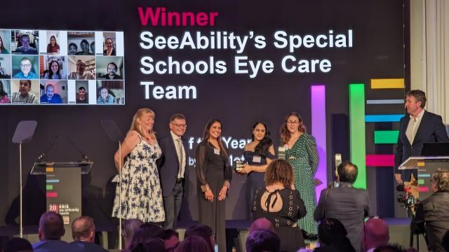 The SeeAbility Eye Care Team on stage with their award