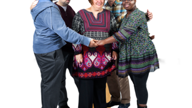 A person being kept safe by a group of people