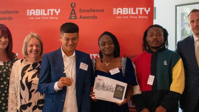 Giban's team accept their award