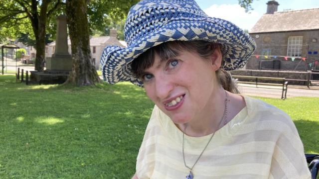 Catherine smiling in the garden at Aldershot