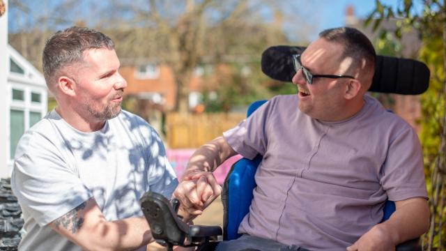James with his support worker Carl
