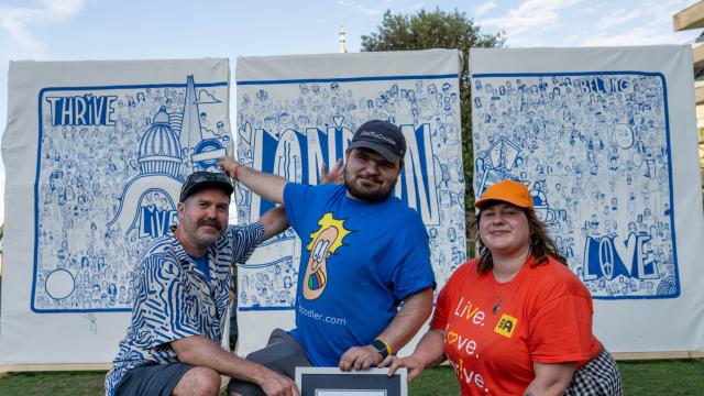 Luke, Alex and Georgie in front of the mural