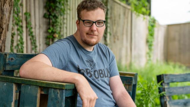 Tim sitting in his garden